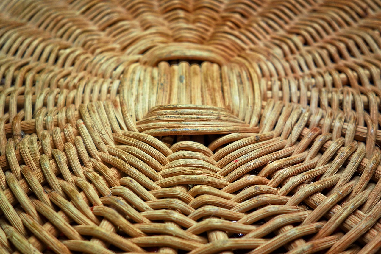 Close up view of a handwoven artisan scarf showing detailed weave and natural colors