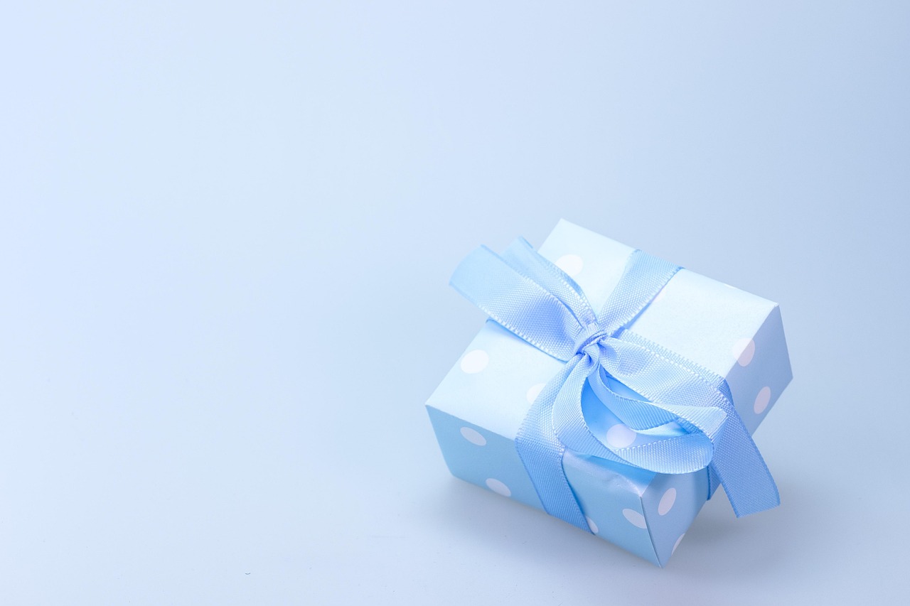 gift wrapped with washi tape, jute twine, and a dried orange slice